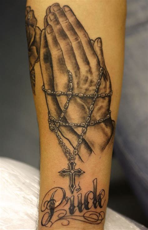 foot tattoos rosary|prayer hands with rosary tattoos.